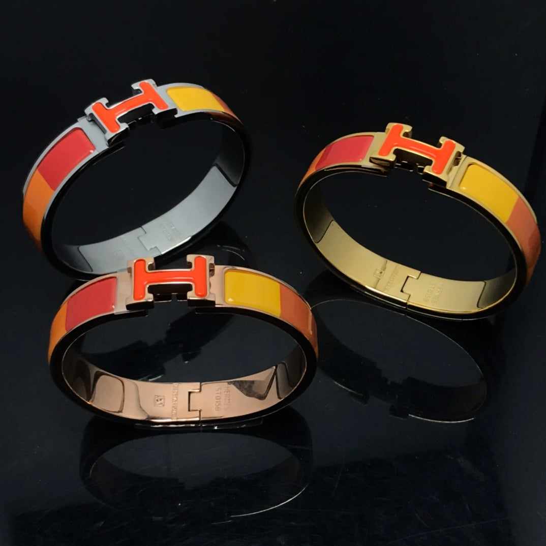 [Elitejewels]HM ARMBAND ORANGE REGENBOGEN KERAMIK