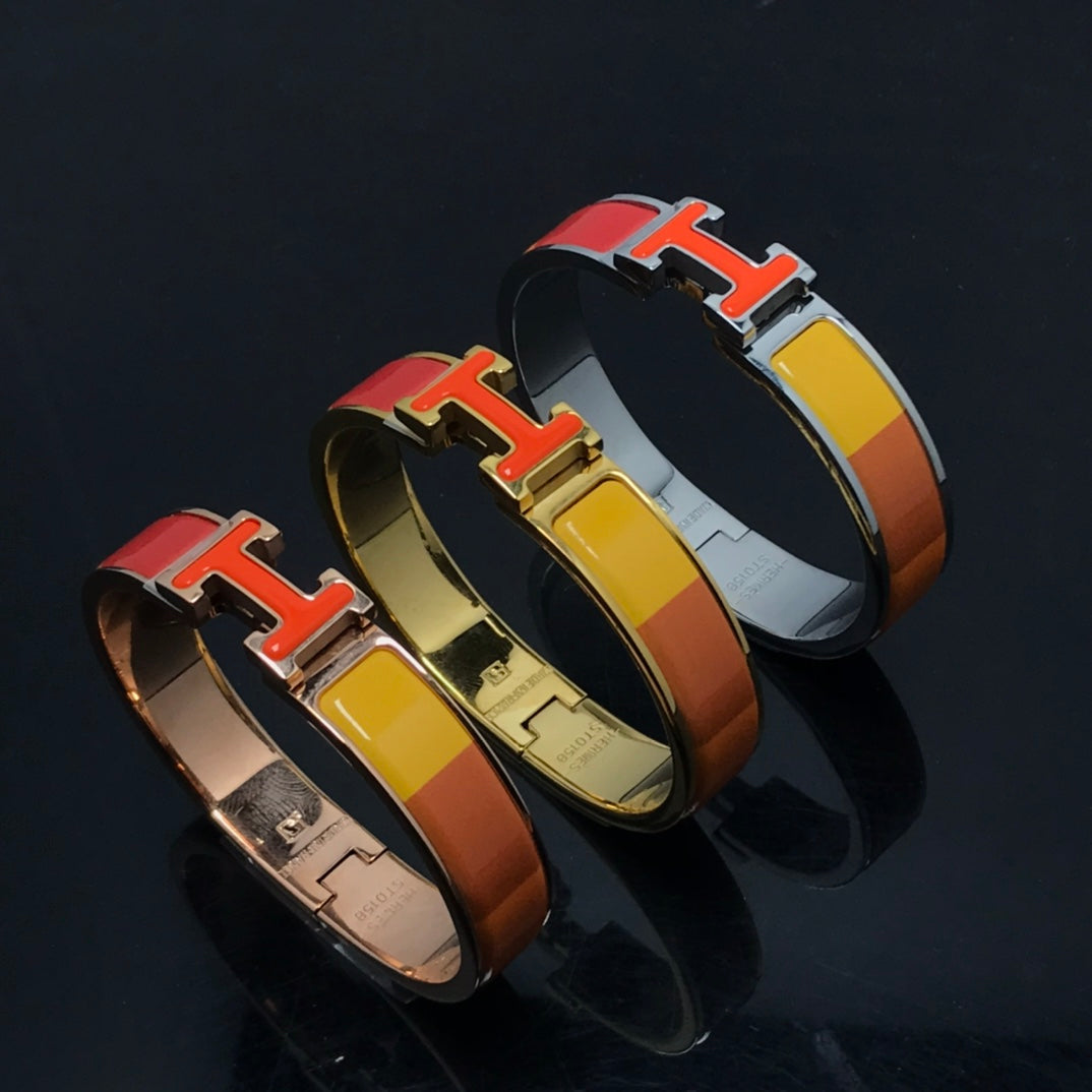 [Elitejewels]HM ARMBAND ORANGE REGENBOGEN KERAMIK