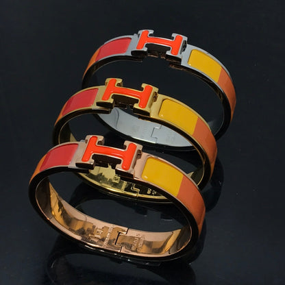 [Elitejewels]HM ARMBAND ORANGE REGENBOGEN KERAMIK