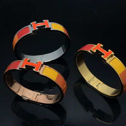 [Elitejewels]HM ARMBAND ORANGE REGENBOGEN KERAMIK