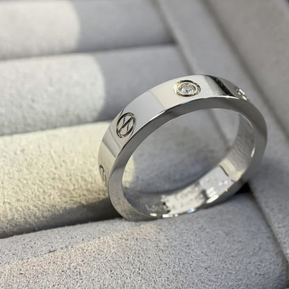 [Elitejewels] LIEBESRING 4MM 1 DIAMANT SILBER